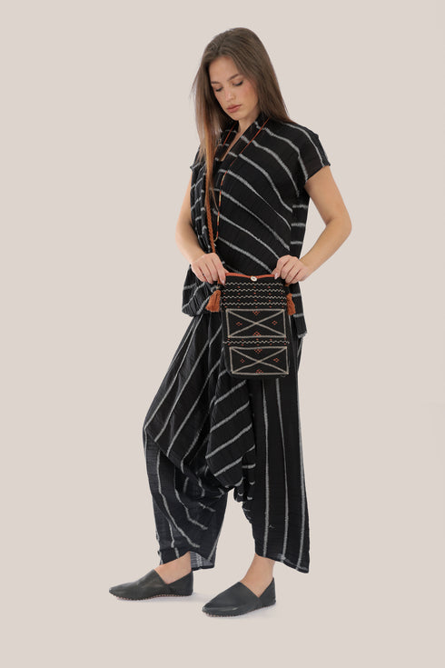 Sleeveless wrap top with crinkle striped and draped front